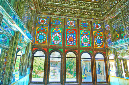 SHIRAZ, IRAN - OCTOBER 12, 2017: The stained-glass windows in mirror hall of Zinat Ol-Molk mansion, on October 12 in Shiraz.のeditorial素材