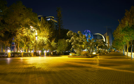 BAKU, AZERBAIJAN - OCTOBER 9, 2017: Baku Boulevard is the most beloved place for evening walks among...