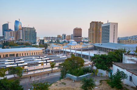 The view on Baku Railway Station with modern trains on platforms, Baku, Azerbaijanのeditorial素材