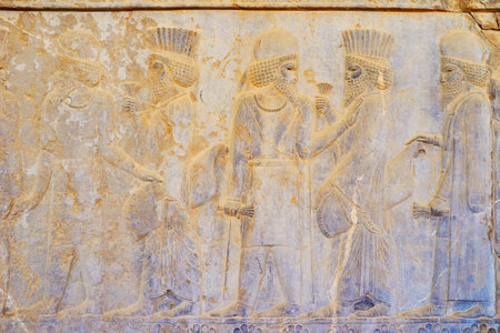 PERSEPOLIS, IRAN - OCTOBER 13, 2017: The ancient relief on wall of Eastern Stairway of Apadana...