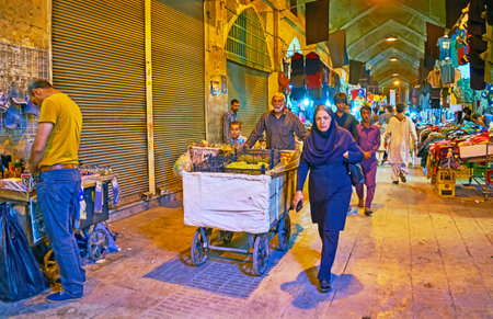 SHIRAZ, IRAN - OCTOBER 12, 2017: The crowded street of Vakil Bazaar, clients, street vendors and tourists go in different directions, on October 12 in Shiraz.のeditorial素材