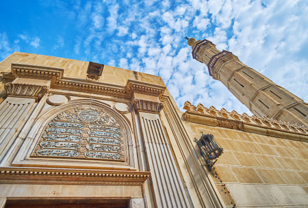 The stone facade wall of Imam Al Busiri mosque decorated with carved inscription from Quran, Alexandria, Egypt.のeditorial素材