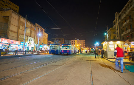 ALEXANDRIA, EGYPT - DECEMBER 17, 2017: The terminal tram station in Mahta Al Raml square, vintage blue trams wait for departure, on December 17 in Alexandria.のeditorial素材