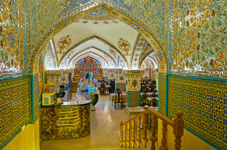 ISFAHAN, IRAN - OCTOBER 20, 2017: The luxury interior of traditional Persian Bastani restaurant, located next to Shah's mosque in Naqsh-e Jahan square, on October 20 in Isfahan.Isfahan.のeditorial素材