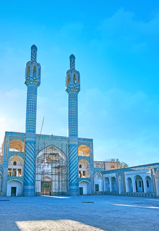 The Hosseiniyeh of Shah Nematollah Vali Shrine with twin minarets of Mohammad Shahi, Mahan, Iran.のeditorial素材