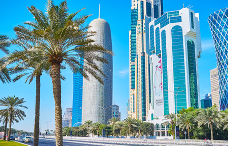 DOHA, QATAR - FEBRUARY 13, 2018: Corniche street is perfect place for walk and enjoy the futuristic...