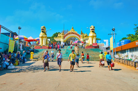 KYAIKTIYO, MYANMAR - FEBRUARY 16, 2018: The huge lions guard the entrance to Kyaiktiyo Pagoda, also famous as the Golden Rock, on February 16 in Kyaiktiyo.のeditorial素材