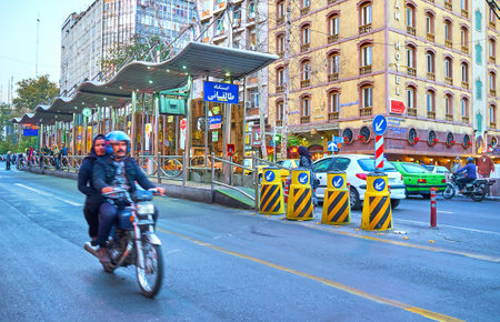 TEHRAN, IRAN - OCTOBER 24, 2017: Traffic in Vali Asr Avenue, the longest street of the Middle East and the main shopping area of the city, on October 24 in Tehran.のeditorial素材