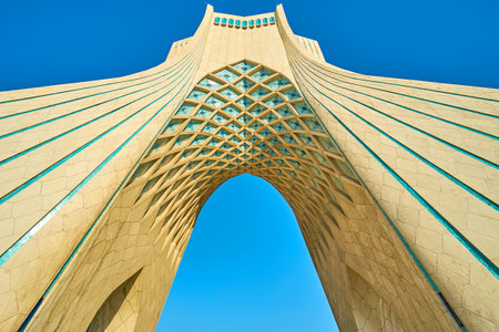TEHRAN, IRAN - OCTOBER 25, 2017: Azadi tower covered with white marble and decorated with geometric tiled elements, on October 24 in Tehranのeditorial素材