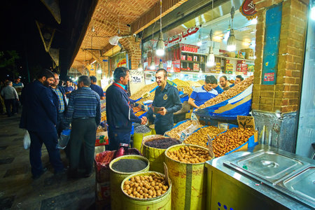 TEHRAN, IRAN - OCTOBER 25, 2017: The nuts shop is one of the most interesting stalls in Grand Bazaar with variety of nuts and other snacks and sweets, on October 24 in Tehranのeditorial素材
