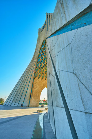 TEHRAN, IRAN - OCTOBER 25, 2017: Beautiful marble Azadi Tower with blue decorations is a fine example of combination ancient persian and modern styles in architecture, on October 24 in Tehranのeditorial素材