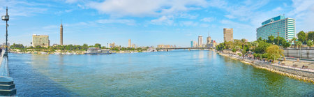 CAIRO, EGYPT - DECEMBER 24, 2017:  The cityscape of Cairo from Qasr El Nil bridge, the Downtown and Rod El Farag districts are separated by Nile river, on December 24 in Cairo.のeditorial素材