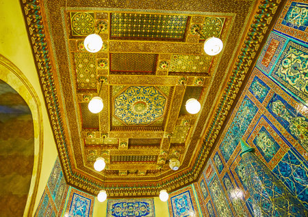 CAIRO, EGYPT - DECEMBER 24, 2017: The ceiling of hall in Residence Building of Manial Palace is decorated with carved wooden screens with relief, painted, muqarnas details and ivory inlays, on December 24 in Cairoのeditorial素材