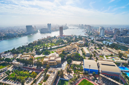 Aerial view of Gezira Island with Opera House and museums and the banks of Nile river with dense...
