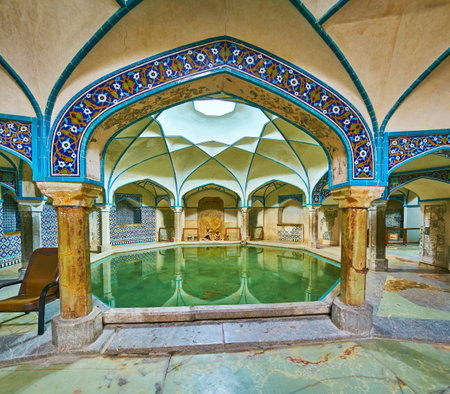 KERMAN, IRAN - OCTOBER 15, 2017: The large pool in Hammam-e Ganjali Khan - famous tourist landmark with preserved interiors and decorations, on October 15 in Kerman.のeditorial素材