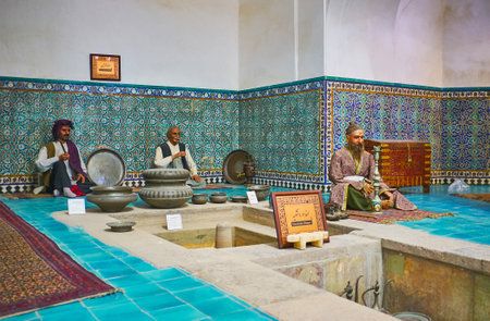 KERMAN, IRAN - OCTOBER 15, 2017: One of sections of dressing room in Ganjali Khan Bathhouse with beautiful tilework on walls, on October 15 in Kerman.のeditorial素材