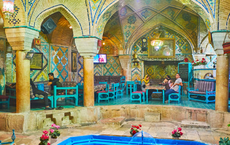 KERMAN, IRAN - OCTOBER 15, 2017: The medieval Vakil Bathhouse nowadays serves as the teahouse and restaurant with splendid historical interior and tasty cuisine, on October 15 in Kerman.のeditorial素材