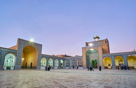 KERMAN, IRAN - OCTOBER 15, 2017: The twilight sky over the courtyard of Jame Mozaffari Mosque,...
