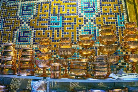 The beautiful copper cookware in outdoor stall of Ganjali Khan Bazaar in old Kerman, Iran.のeditorial素材