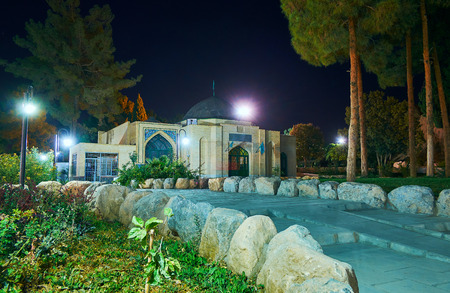 The Enghelab park in old town of Kerman boasts lush greener and architectural landmarks, such as ancient Dokhtar Castle, small shrines and mausoleums, Iran.の写真素材