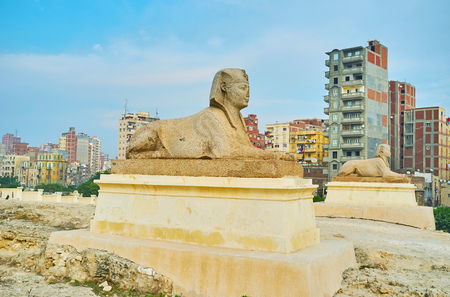 The great statues of sphinxes decorate the Amoud Al Sawari archaeological site, Alexandria, Egypt.の写真素材