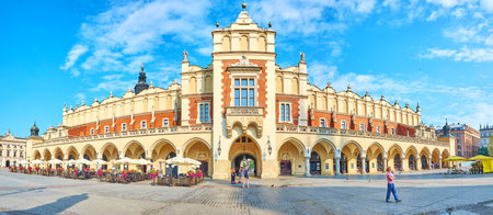 KRAKOW, POLAND - JUNE 11, 2018: Panorama of Cloth Hall (Sukiennice) -  located on Main Square (Plac Mariacki) and serving as the handicraft market with interesting souvenirs, on June 11 in Krakow.のeditorial素材