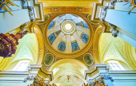 KRAKOW, POLAND - JUNE 11, 2018: Modestly decorated main cupola of St. Bernard of Siena Church with pictures of Apostles, on June 11 in Krakow.のeditorial素材