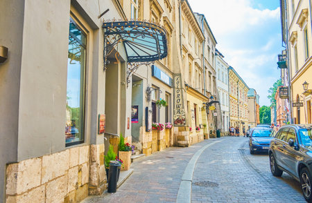 KRAKOW, POLAND - JUNE 11, 2018: To feel the spirit of the city is possible only walking along its...
