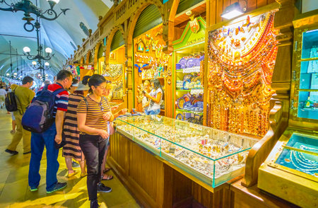 KRAKOW, POLAND - JUNE 11, 2018: The best range of amber pieces is offered in one of jewellery stalls inside Sukiennice market, on June 11 in Krakowのeditorial素材