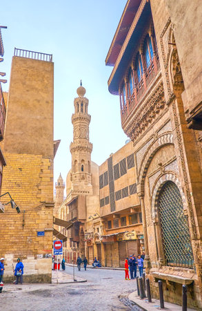 CAIRO, EGYPT - DECEMBER 23, 2017: The morning is the best time to walk along empty and calm Al-Muizz street, enjoying beautiful medieval architecture of historical neighborhood, on December 23 in Cairoのeditorial素材