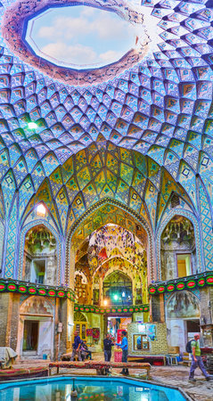 KASHAN, IRAN - OCTOBER 22, 2017: The intericate interior of Aminoddole Caravanserai (Timche-ye Amin od-Dowleh) - the visit card of the city and its medieval market, on October 22 in Kashan.のeditorial素材