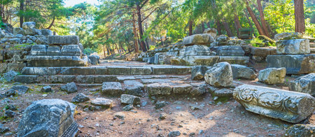 The boulders with preserved carvings at the ruins of antique Hadrian's Gate of Phaselis archaeological site, Tekirova, Turkey.のeditorial素材