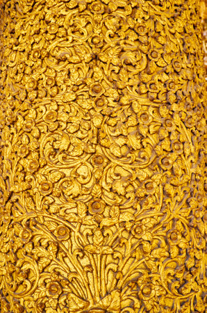 Close-up of ornate plasterwork with floral motives, covered with gilt,  Kassapa Buddha Image House of Shwedagon Zedi Daw, Yangon, Myanmar.のeditorial素材