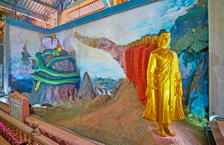 YANGON, MYANMAR - FEBRUARY 27, 2018: Image, depicting Buddha with disciples on Anotatta lake and fight of Nandopananda dragon king with Maha Moggalana, Ngar Htat Gyi Temple, on February 27 in Yangon.のeditorial素材