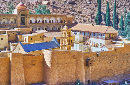 The fortress of St Catherine Monastery with preserved huge stone walls and historical churches, crypts and mosque, Sinai desert, Egypt.のeditorial素材