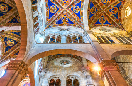 LUCCA, ITALY - APRIL 30, 2013: Lucca Cathedral boasts modest interior in gothic style with beautiful frescoes on its vaults, on April 30 in Luccaのeditorial素材