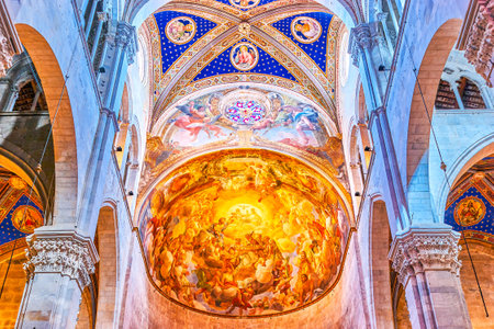 LUCCA, ITALY - APRIL 30, 2013: The beautiful frescoe on the half-cupola of the Apse of Cathedral, on April 30 in Luccaのeditorial素材