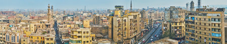 CAIRO, EGYPT - DECEMBER 21, 2017: The old quarters of Islamic Cairo with medieval minarets,...