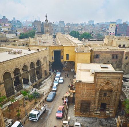 CAIRO, EGYPT - DECEMBER 21, 2017: Aerial view from Bab Zuwayla gate on Al Salih Tala'i mosque and Al Khayama street with Tentmakers covered market, Islamic Cairo district, on December 21 in Cairo.のeditorial素材