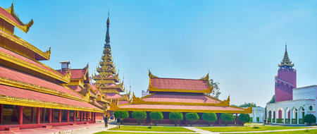 MANDALAY, MYANMAR - FEBRUARY 23 ,2018: Panoramic view on courtyard of Royal Palace with beautiful buildings in oriental style, on February 23 in Mandalayのeditorial素材