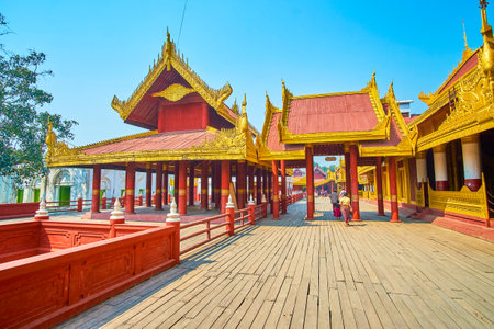 Royal Palace boasts numerous wooden buildings with golden decorations, Mandalay, Myanmarのeditorial素材