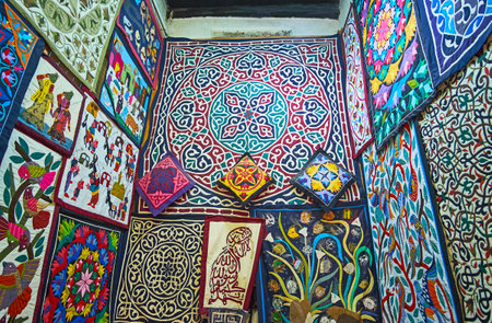 CAIRO, EGYPT - DECEMBER 21, 2017:  Choose handmade appliqued textile pieces in shop of Tentmakers alley (Sharia Khayamiya), on December 21 in Cairo, Egypt.のeditorial素材