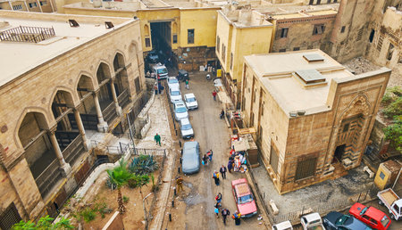 CAIRO, EGYPT - DECEMBER 21, 2017: Panorama of Al Khayama street with famous Tentmakers alley (Sharia Khayamiya) and historic Al Salih Tala'i mosque, on December 21 in Cairo.のeditorial素材