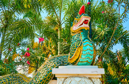 The sculpture of Burmese mythic dragon-serpent Nagar (Nayar) in Kyauktawgyi Pagoda complex, Mandalay, Myanmarのeditorial素材