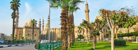 The Saladin Square is rich in greenery, local small gardens suround the medieval landmarks - mosques and walls of Cairo Citadel, Egypt.の写真素材