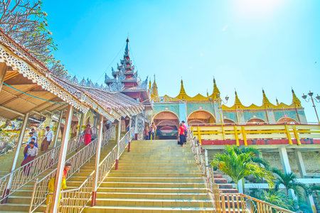 MANDALAY, MYANMAR - FEBRUARY 23, 2018: The covered staircases connecter Su Taung Pyae Temple with lower temple on Mandalay Hill, on February 23 in Mandalay.のeditorial素材