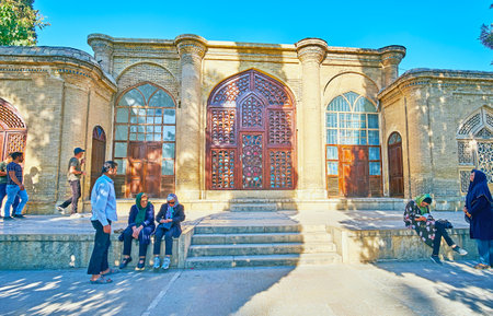 SHIRAZ, IRAN - OCTOBER 13, 2017:  The scenic mansion with wooden Persian screens is part of Hafezieh...