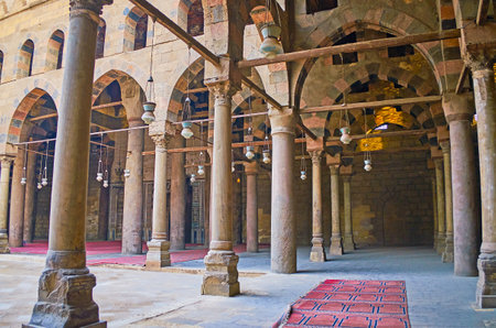 CAIRO, EGYPT - DECEMBER 21, 2017: The gallery with columns around the courtyard of Al-Nasir Muhammad Mosque in Saladin Citadel, on December 21 in Cairoのeditorial素材