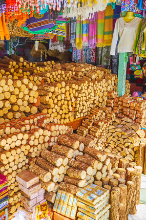 SAGAING, MYANMAR - FEBRUARY 21, 2018: Kaunghmudaw Pagoda market is traditional place to buy thanaka wood - the material for production of authentic Burmese natural cosmetic paste, on February 21 in Sagaing.のeditorial素材