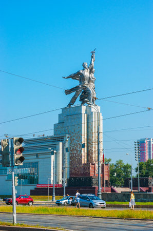 MOSCOW, RUSSIA - JUNE 29, 2013: Observe the statue of Worker and Kolkhoz Woman, created of steel and located in Mira Prospect, on June 29 in Moscow.のeditorial素材
